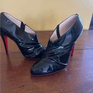 Christian Louboutin Shiny Black Ankle Booties with Iconic Red Soles